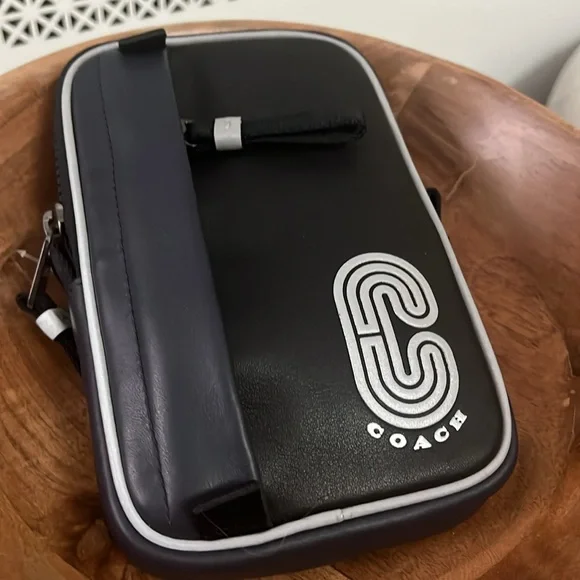 Coach north/south leather pouch